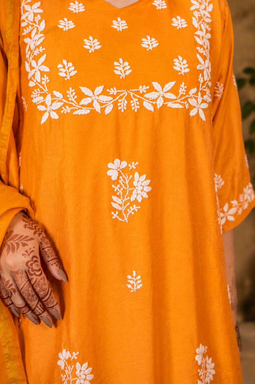 Orange kurta with white floral patterns. Chanderi Silk